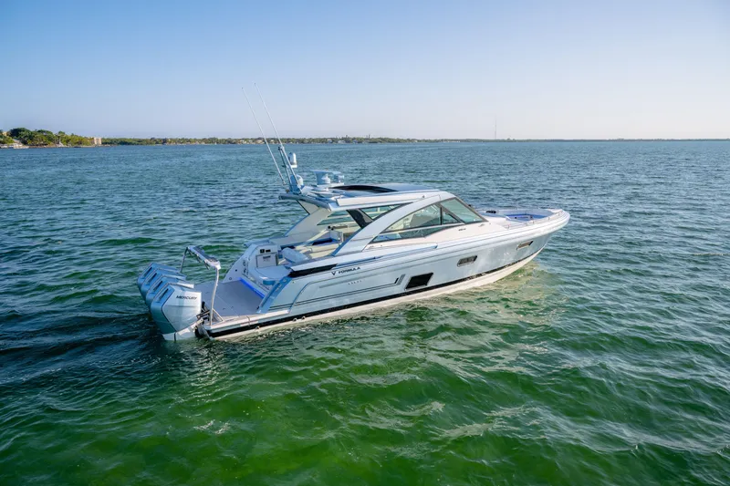 Slide: The Image of 2025 Formula 430 Super Sport Crossover yacht cruising on open water. - 81