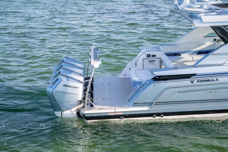 Slide: The Image of 2025 Formula 430 Super Sport Crossover with Mercury engines on water. - 82
