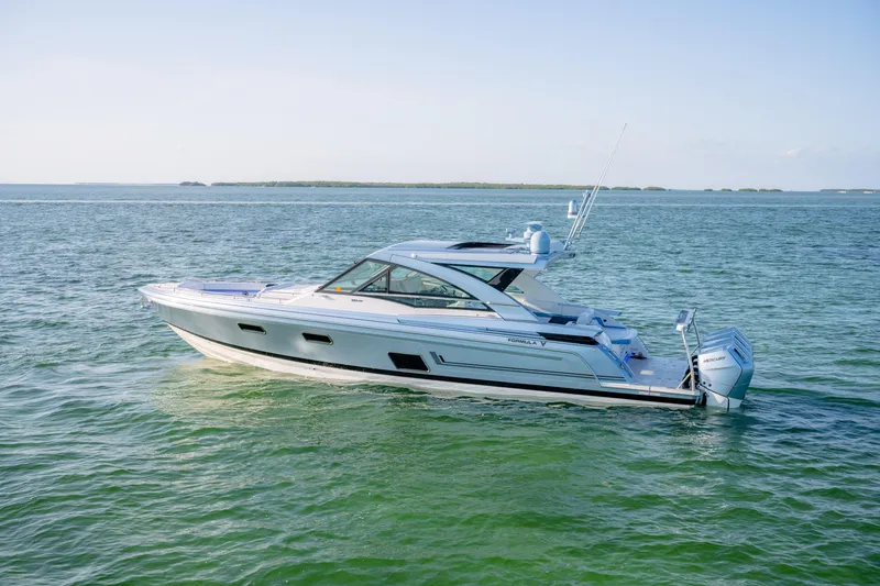 Slide: The Image of 2025 Formula 430 Super Sport Crossover yacht cruising on open water. - 99