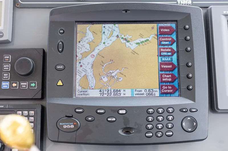 Slide: The Image of Navigation system on a 2004 Tiara Yachts 3600 Sovran displaying a nautical chart. - 14