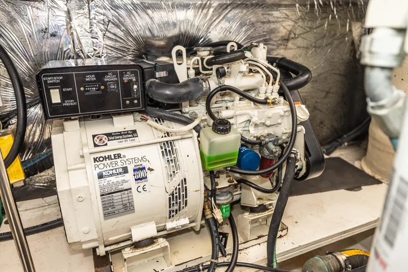 Slide: The Image of Engine room of 2004 Tiara Yachts 3600 Sovran featuring Kohler power system. - 20