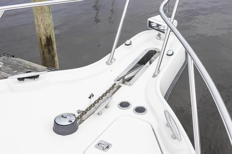 Slide: The Image of Bow of 2004 Tiara Yachts 3600 Sovran with anchor chain and railing. - 22