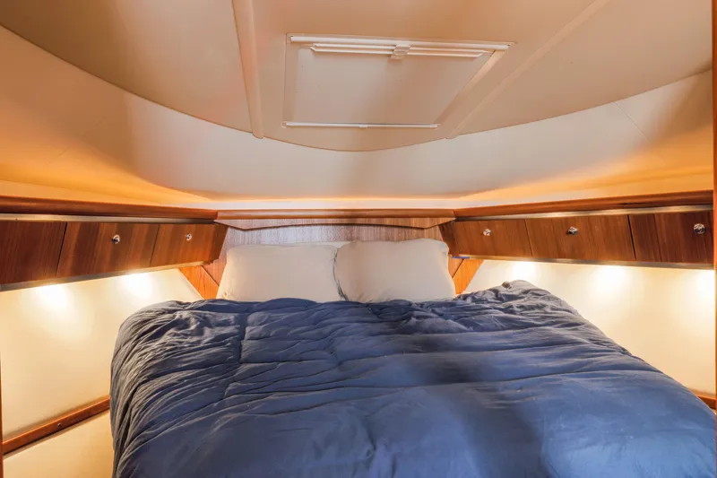 Slide: The Image of Luxurious cabin interior of 2004 Tiara Yachts 3600 Sovran with cozy bedding. - 8