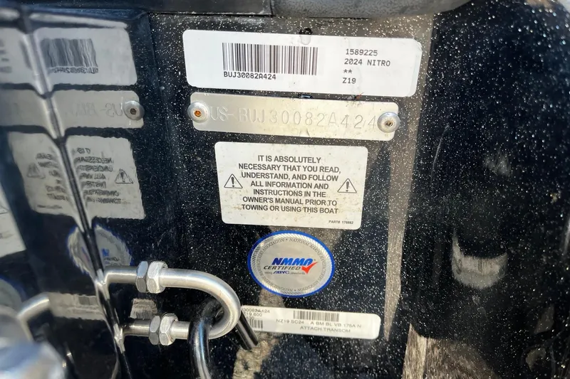 Slide: The Image of 2024 Nitro Z19 boat identification and safety instruction labels. - 10