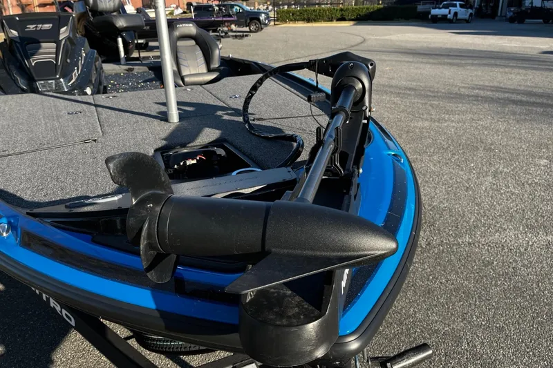 Slide: The Image of 2024 Nitro Z19 boat with trolling motor on a sunny day. - 7