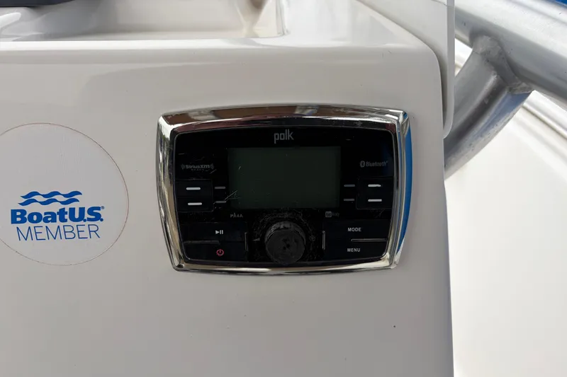Slide: The Image of Control panel on 2017 Tidewater 198 CC Adventure boat with BoatUS Member sticker. - 11