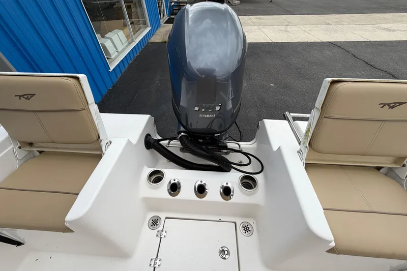 Slide: The Image of 2017 Tidewater 198 CC Adventure boat with Yamaha outboard motor and beige seating. - 15