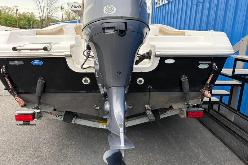 Slide: The Image of Rear view of a 2017 Tidewater 198 CC Adventure boat with outboard motor. - 19