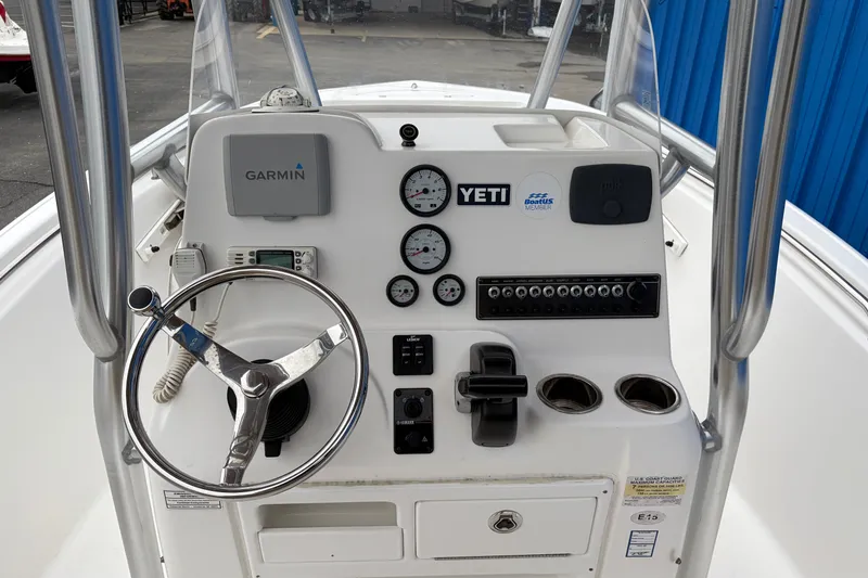 Slide: The Image of 2017 Tidewater 198 CC Adventure boat console with Garmin and Yeti accessories. - 9