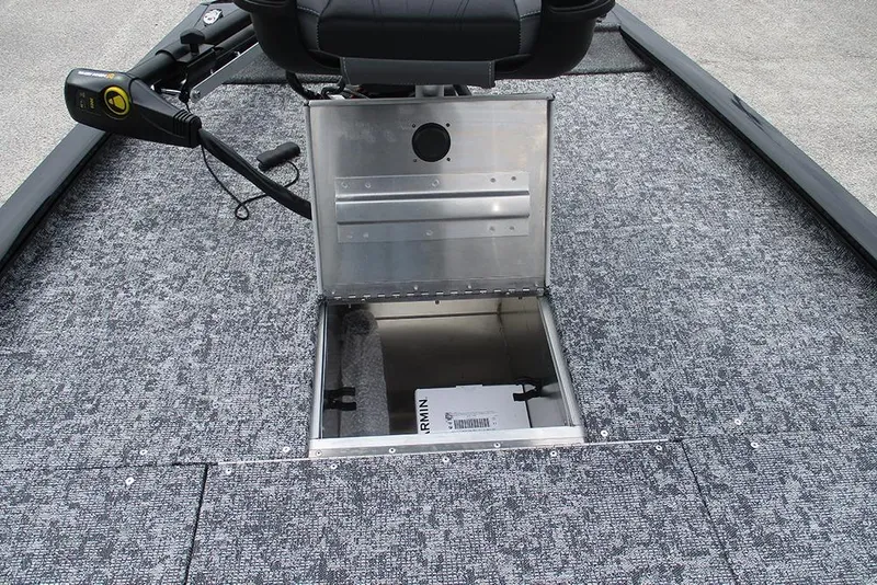 Slide: The Image of 2026 Tracker Pro 170 boat interior with open storage compartment and seat. - 11