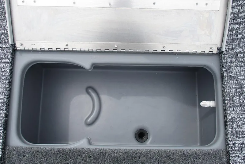 Slide: The Image of Livewell compartment in 2026 Tracker Pro 170 boat, featuring durable construction and drainage system. - 14