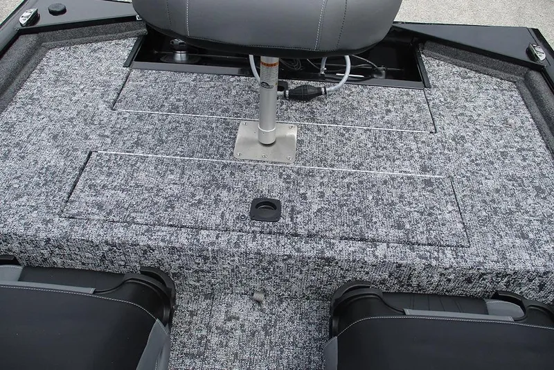 Slide: The Image of 2026 Tracker Pro 170 boat interior with gray textured flooring and seating. - 15
