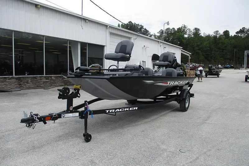 Slide: The Image of 2026 Tracker Pro 170 boat on trailer outside dealership, ready for transport. - 3