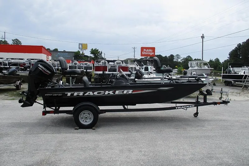 Slide: The Image of 2026 Tracker Pro 170 boat on trailer in outdoor storage lot. - 5
