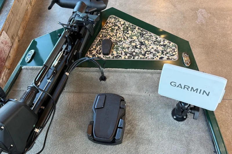 Slide: The Image of 2026 Tracker Bass Tracker Classic Limited boat with Garmin navigation system and trolling motor. - 15