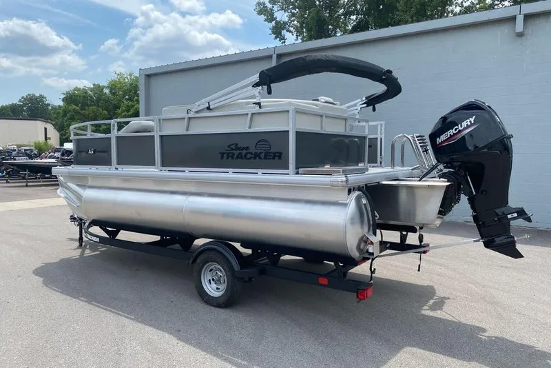 Slide: The Image of 2026 Sun Tracker Bass Buggy 16 XL Select pontoon boat with Mercury outboard motor. - 84