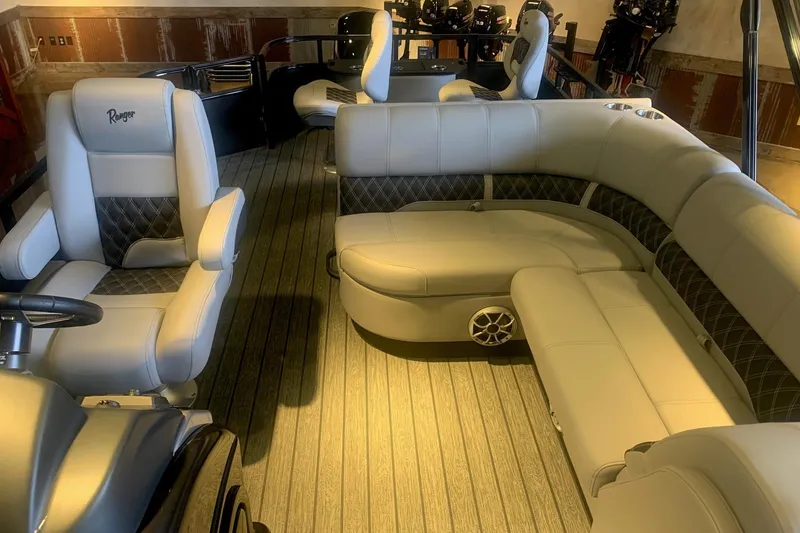 Slide: The Image of Luxurious interior of 2026 Ranger 223F boat with plush seating and modern design. - 8