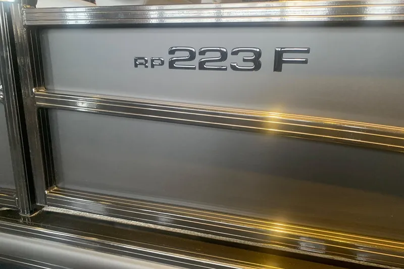 Slide: The Image of 2026 Ranger 223F model emblem on sleek metallic surface. - 1