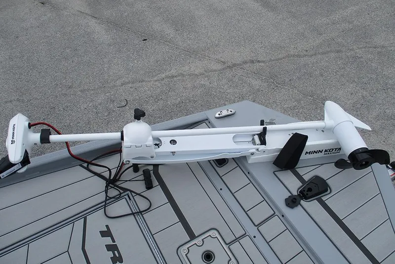 Slide: The Image of 2026 Tracker Bass Tracker Classic CC with Minn Kota trolling motor on deck. - 11