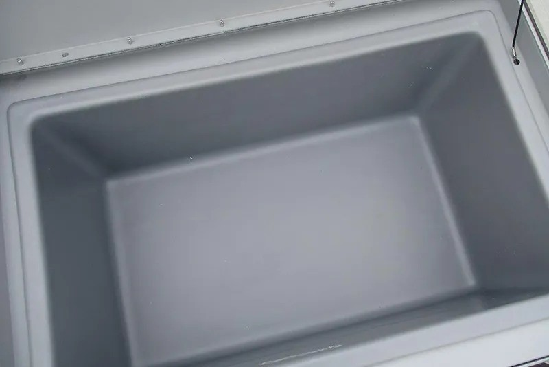 Slide: The Image of Empty storage compartment in 2026 Tracker Bass Tracker Classic CC boat. - 14