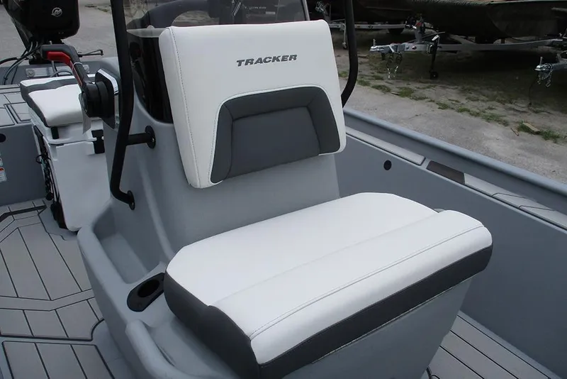 Slide: The Image of 2026 Tracker Bass Tracker Classic CC boat seat, white and gray upholstery, sleek design. - 15