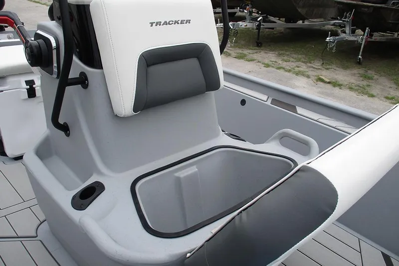 Slide: The Image of 2026 Tracker Bass Tracker Classic CC boat seat with storage compartment and cup holder. - 16