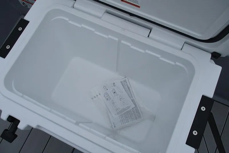 Slide: The Image of Open storage compartment in 2026 Tracker Bass Tracker Classic CC boat. - 20