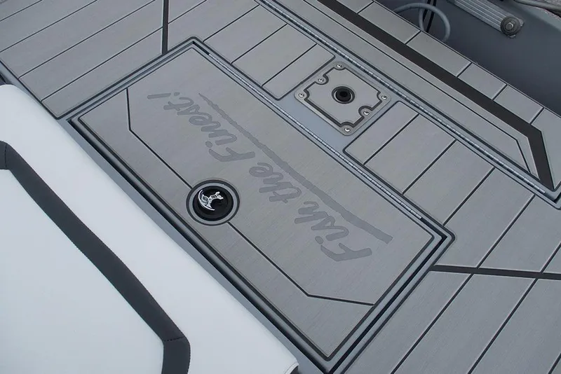 Slide: The Image of 2026 Tracker Bass Tracker Classic CC boat deck with "Fish the Finest" logo. - 21