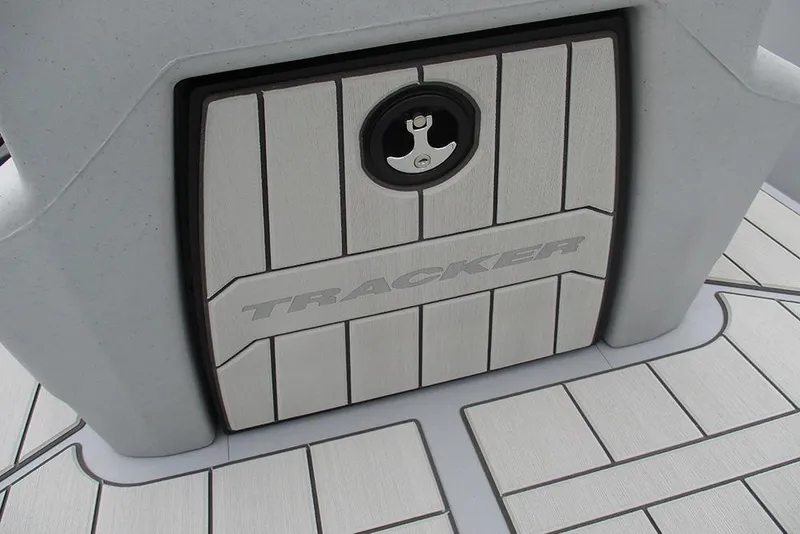 Slide: The Image of 2026 Tracker Bass Tracker Classic CC boat deck with logo and latch detail. - 24