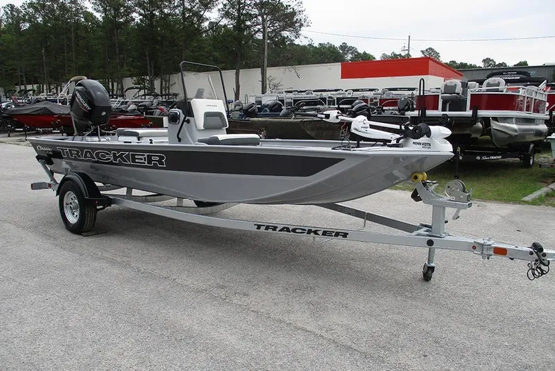 Slide: The Image of 2026 Tracker Bass Tracker Classic CC boat on trailer in outdoor setting. - 6
