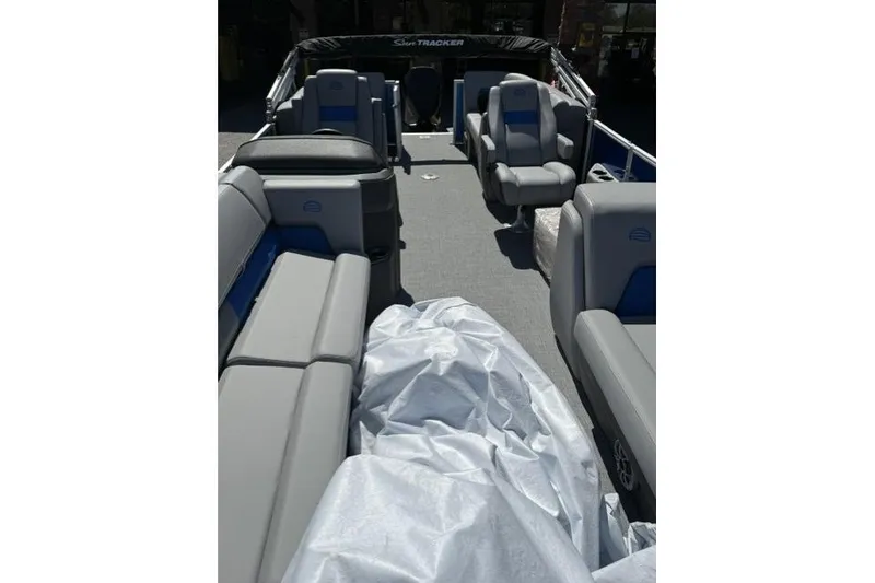 Slide: The Image of 2026 Sun Tracker Party Barge 24 XP3 interior with spacious seating and modern design. - 11
