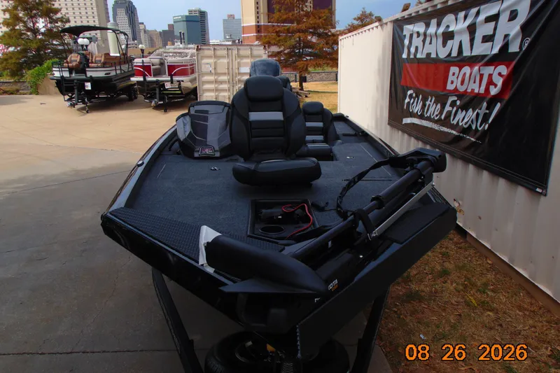 Slide: The Image of 2026 Ranger RT178 fishing boat displayed outdoors with city skyline backdrop. - 96