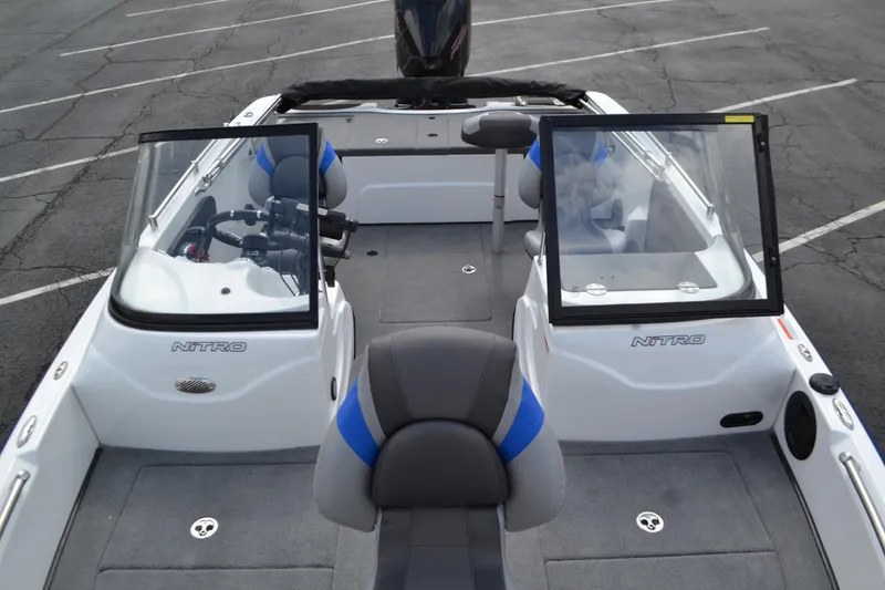 Slide: The Image of 2026 Nitro ZV19 Sport Pro boat interior with dual consoles and seating. - 64