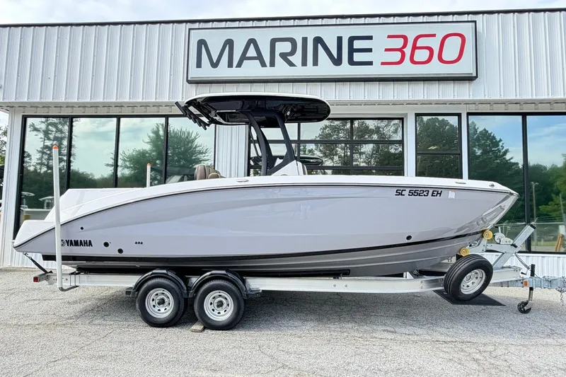 The Image of 2026 Yamaha Boats 255 FSH Sport H on trailer at Marine 360 dealership. - 0