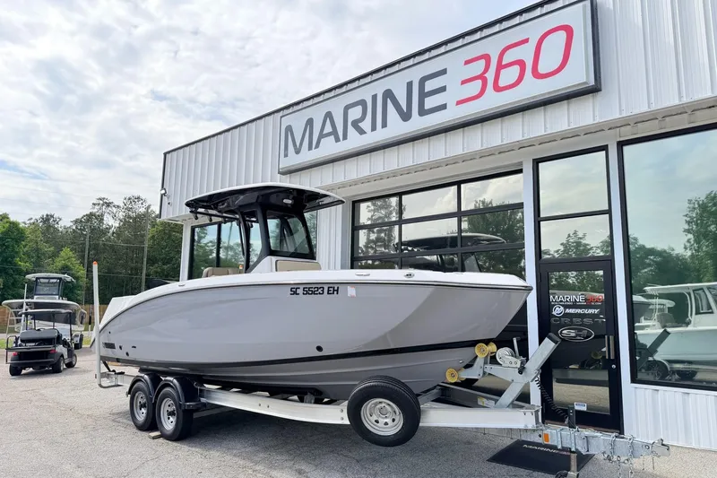 Slide: The Image of 2026 Yamaha Boats 255 FSH Sport H on trailer at Marine 360 dealership. - 1
