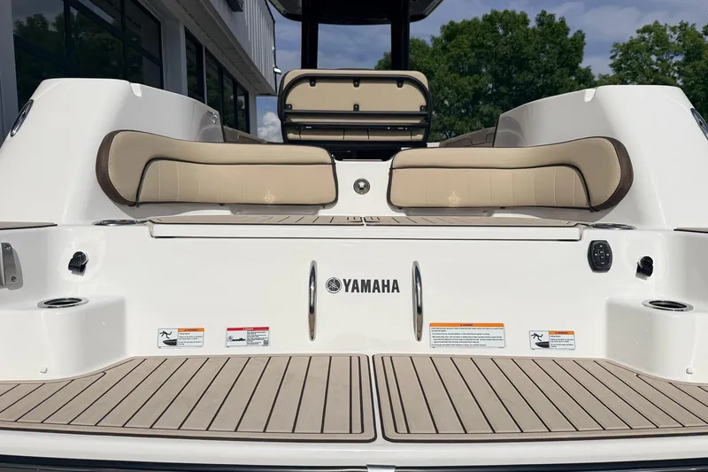 Slide: The Image of 2026 Yamaha Boats 255 FSH Sport H, featuring sleek seating and modern design. - 26
