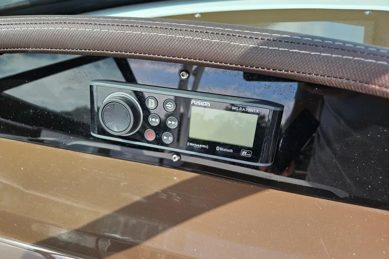 Slide: The Image of Fusion MS-RA70NSX stereo system on 2020 Monterey M-225 boat dashboard. - 28