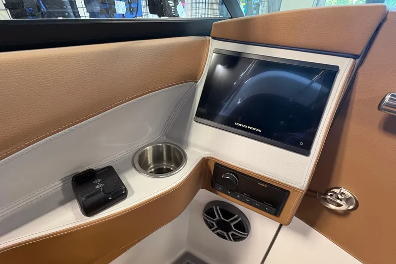Slide: The Image of Interior of 2026 Regal LS6 boat with Volvo Penta display and Fusion audio system. - 10