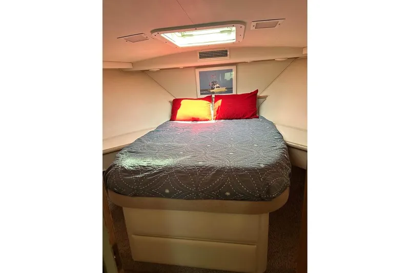 Slide: The Image of Bunk beds in 1991 Hatteras 43 Convertible yacht cabin with decorative pillow. - 12