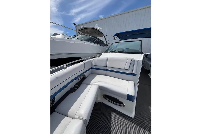 Slide: The Image of 2018 Formula 330 Crossover Bowrider I/O with spacious seating and sleek design. - 12