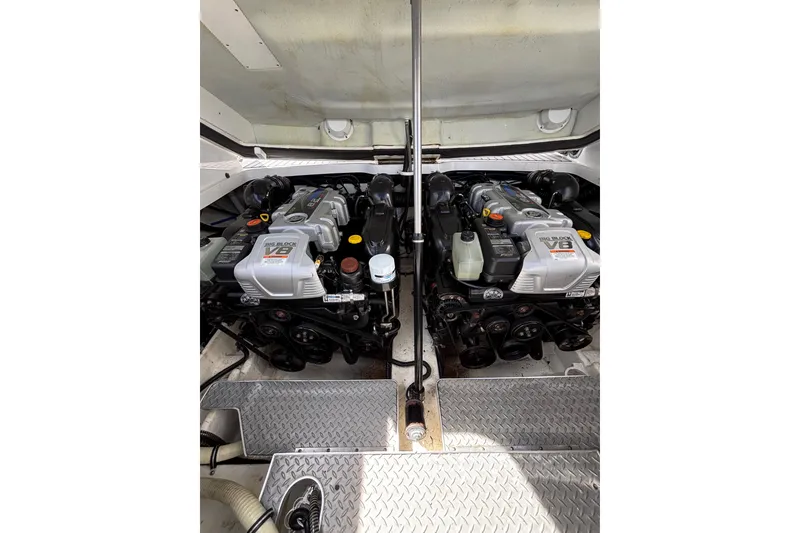 Slide: The Image of Engine compartment of a 2018 Formula 330 Crossover Bowrider I/O with dual V8 engines. - 20