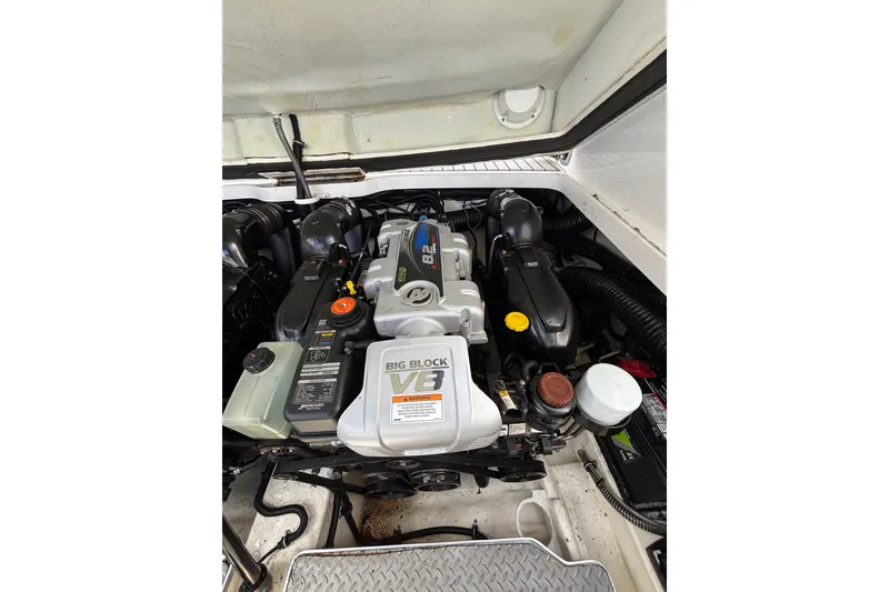 Slide: The Image of Engine compartment of 2018 Formula 330 Crossover Bowrider I/O with V8 engine. - 22