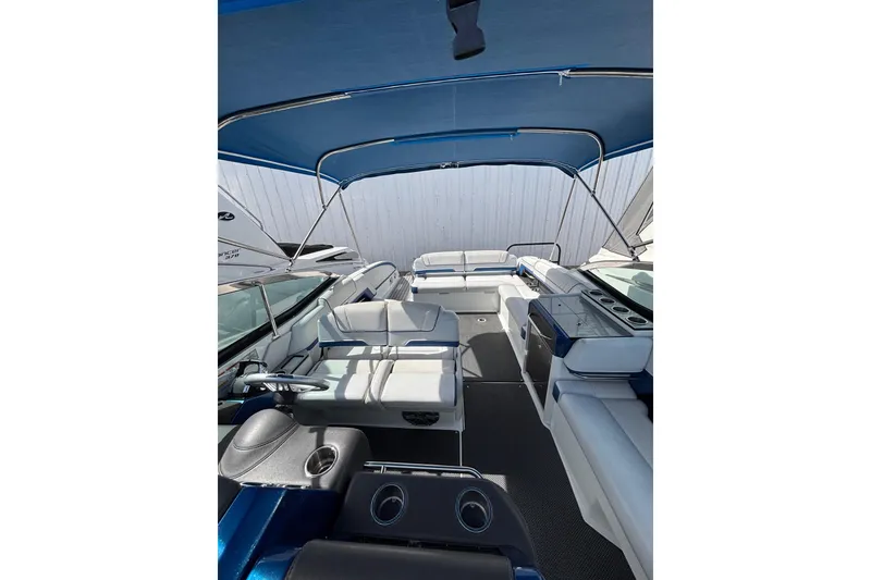 Slide: The Image of 2018 Formula 330 Crossover Bowrider I/O interior with spacious seating and sleek design. - 6
