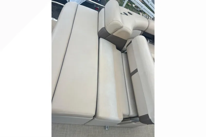 Slide: The Image of Beige seating on 2019 Harris Cruiser 210 boat, showcasing comfortable design. - 30