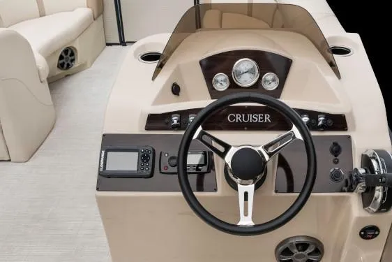 Slide: The Image of Manufacturer Provided Image: 2019 Harris Cruiser 210 boat dashboard with steering wheel and control panel. - 7