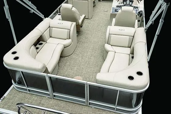 Slide: The Image of Manufacturer Provided Image: 2019 Harris Cruiser 210 pontoon boat interior with beige seating and carpet. - 8