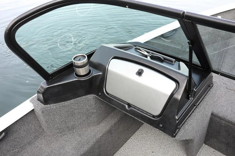 Slide: The Image of Manufacturer Provided Image: 2025 Lund 1650 Rebel XL Sport boat dashboard with windshield and cup holder. - 4
