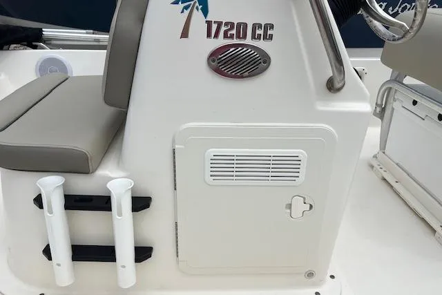Slide: The Image of 2024 Key West 1720 Center Console boat interior with seating and storage features. - 9