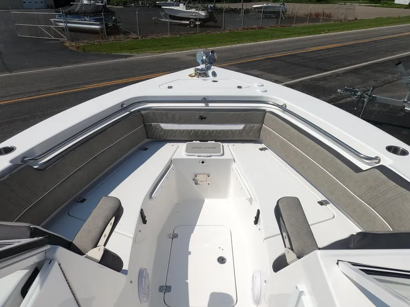 Slide: The Image of 2024 Sea Pro 240 Dual Console boat with foldable rear bench seat. - 10
