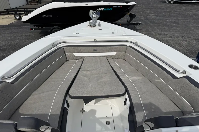 Slide: The Image of 2024 Sea Pro 240 Dual Console boat with spacious seating and sleek design. - 18